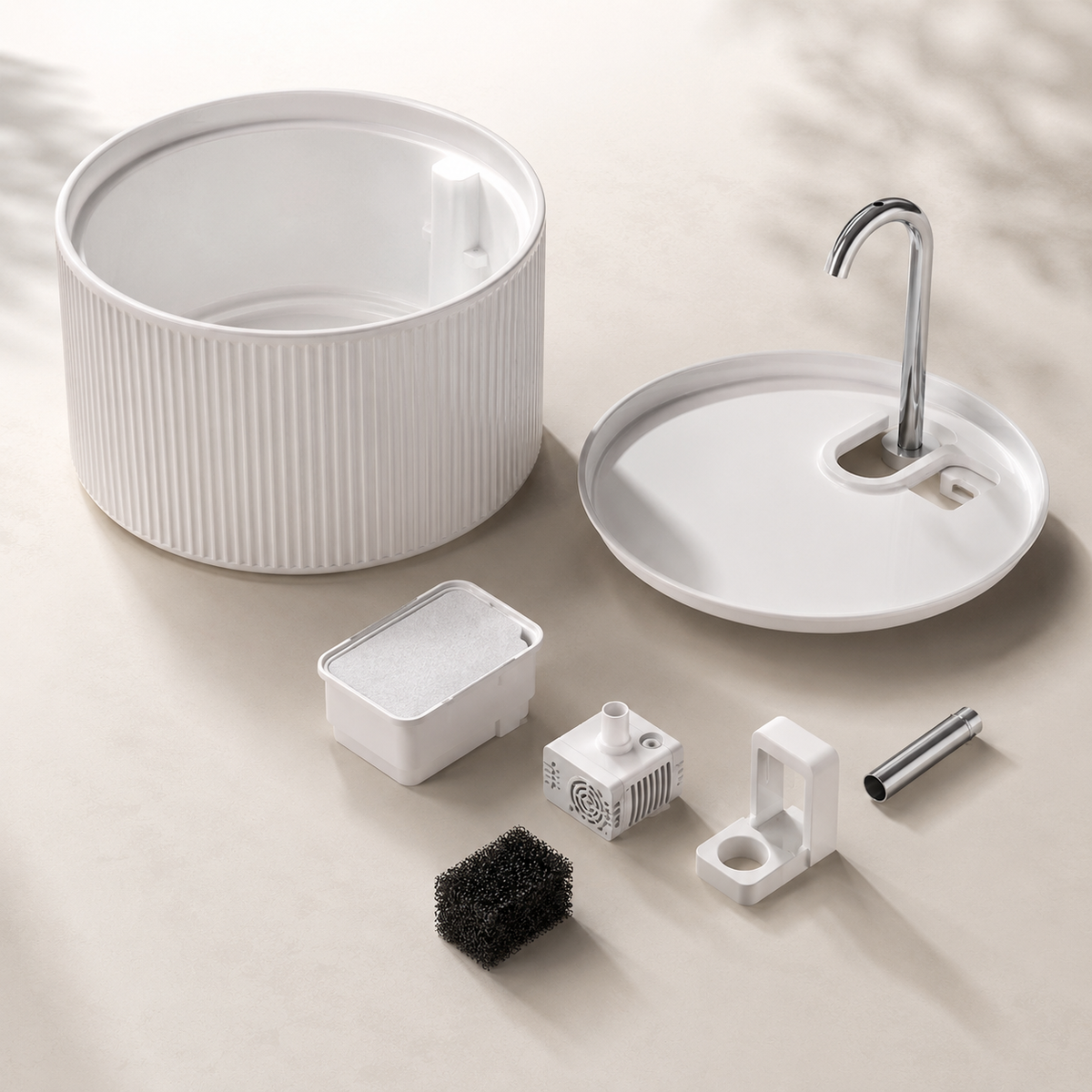 Sora Flow 2.2 ceramic cat fountain components shown disassembled for cleaning